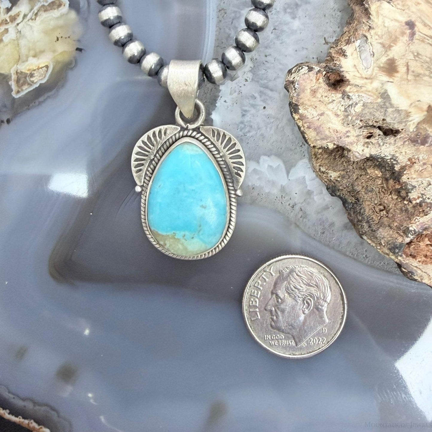 Sterling Silver Southwestern Style Wide Teardrop Kingman Turquoise Decorated Pendant