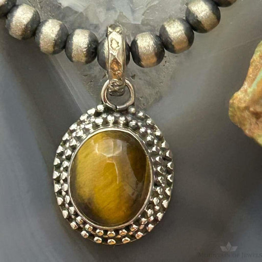 Sterling Silver Southwestern Style Oval Tiger's Eye Decorated Charm/Pendant For Women