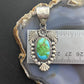 Sterling Southwestern Style Oval Sonora Gold Turquoise Leaves Decorated Pendant