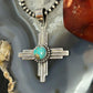 Sterling Silver Southwestern Style Round Mohave Turquoise Unisex Zia Pendant