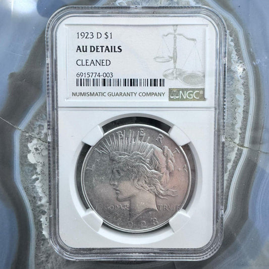 1923-D US 90% Peace Silver Dollar NGC AU DETAILS Cleaned #6915774-003DE