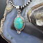 Sterling Silver Southwestern Style Oval Turquoise Decorated Pendant For Women