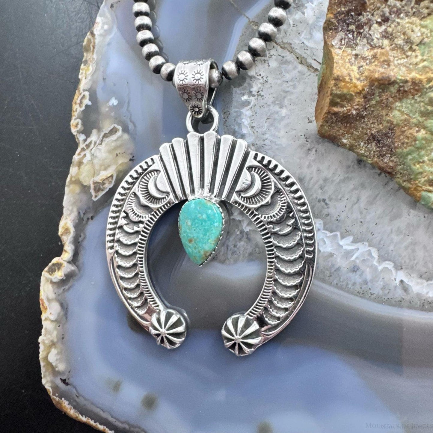 Sterling Silver Southwestern Style Teardrop Turquoise Stamped Naja Uni Pendant