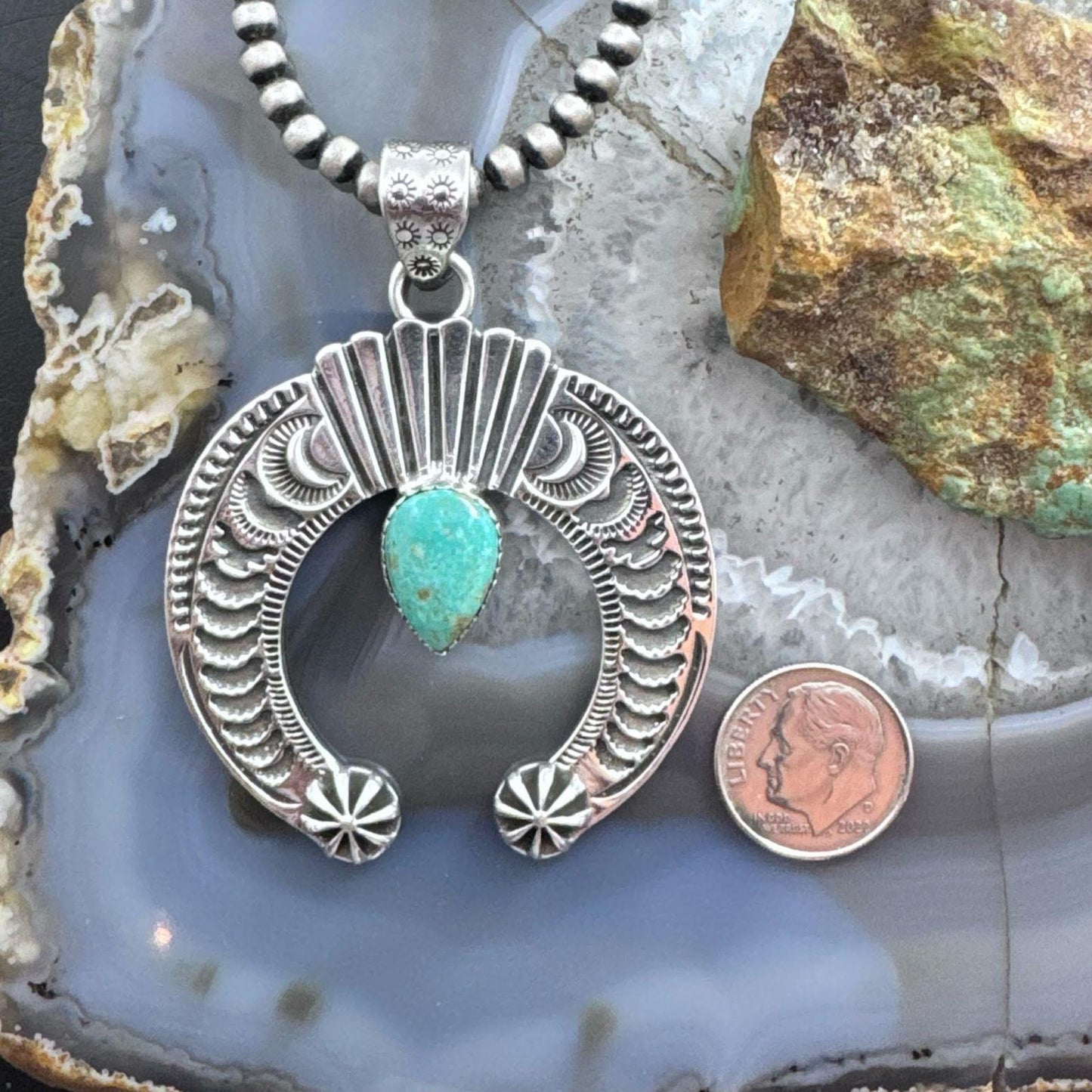 Sterling Silver Southwestern Style Teardrop Turquoise Stamped Naja Uni Pendant